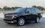 Что лучше cadillac escalade или chevrolet tahoe
