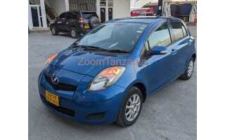 Где на toyota vitz номер кузова