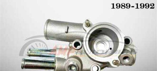 Где у toyota королла термостат