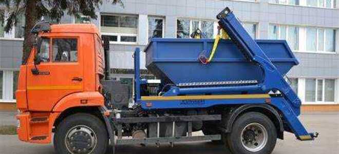 Как погрузчик грузит камаз