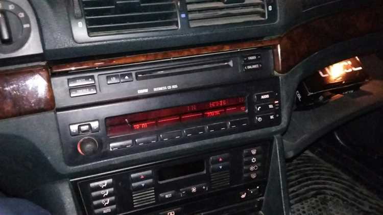 Как снять business cd bmw e53