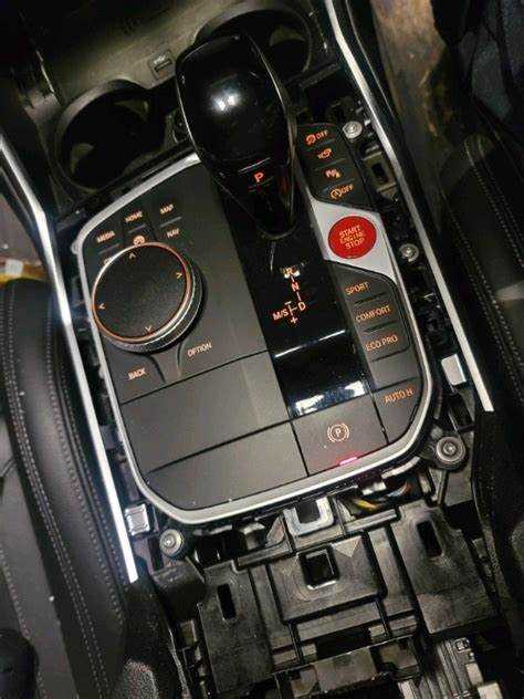 Процесс демонтажа центральной консоли BMW G12