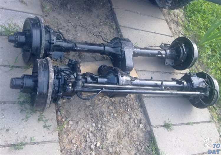 Особенности снятия амортизатора с кронштейна передней оси