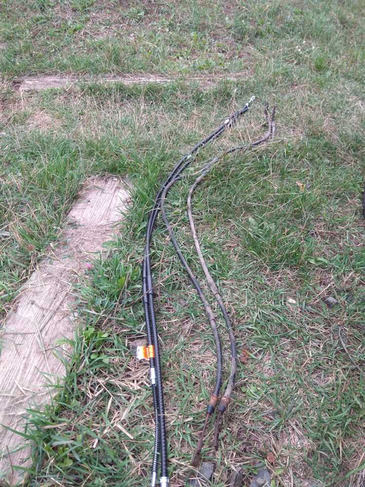 Подъем автомобиля и снятие колес для доступа к механизму