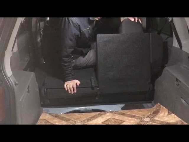 Где находится механизм складывания спинки заднего сиденья