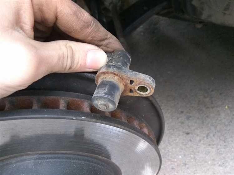 Расположение датчика аэрбег в водительском сиденье Toyota Corolla 120